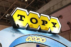 Topy Industries signage and logo